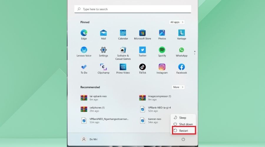 Chọn "Restart" từ menu nguồn để khởi động lại máy tính và chuẩn bị cho quá trình Recovery.