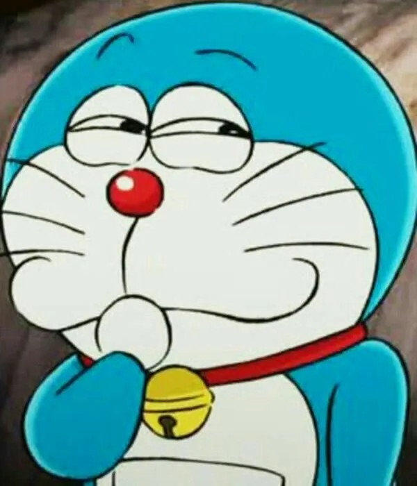 Hình troll mèo máy ánh mắt troll nhẹ
